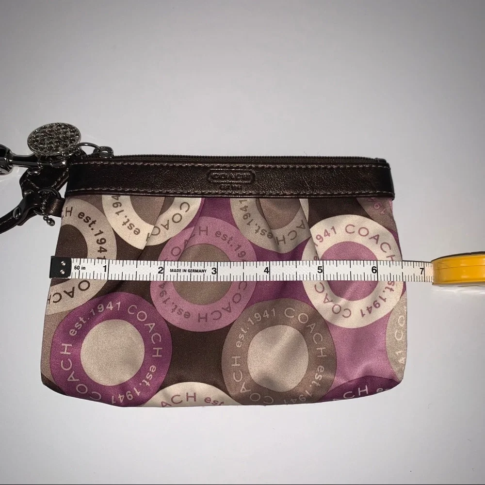 Coach Wristlet Wristlet Pouch With A Brown And Purple 
